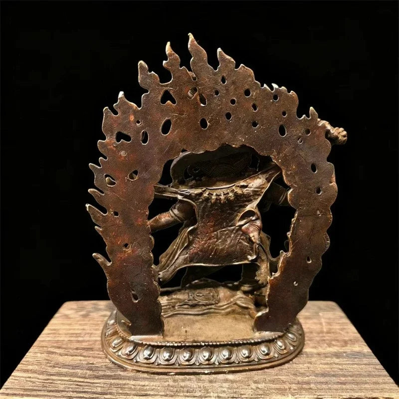 statue religieuse tibetaine bronze figurine details sculptés elements feu crâne base decorée poids indiqué