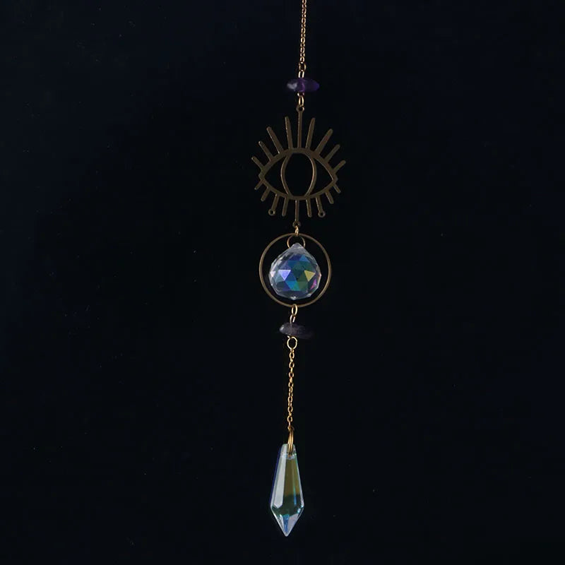 bijou pendentif cristal or bleu violet vert formes géométriques motifs oculaires translucides boho chic