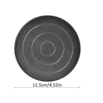 support poterie noir circulaire gravure centrale moderne opaque sculpteur potier