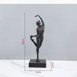 statuette ballerine moderne noire texturée socle deux livres fashion