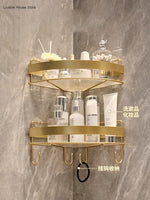 étagère salle bain dorée grille métal moderne fixée suction rangement produits toilette crochet