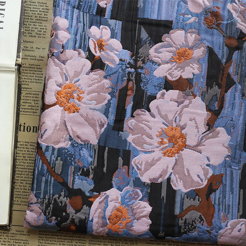 tissu imprimé fleurs blanches orange fond bleu noir résistant bricolage couture rétro 145cm