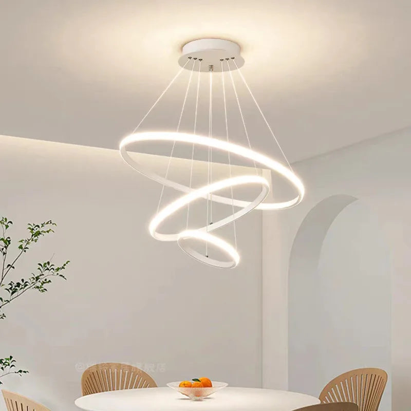 suspension lumineuse moderne anneaux superposés blanc noir or led chambre restaurant étude couloir