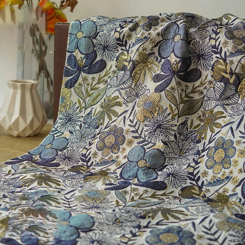 tissu imprimé fleurs stylisées blanc bleu vert moderne élégant polyester large 160cm résistant intempéries
