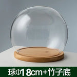 boule verre transparent socle bois décoration d'intérieur moderne objet d'exposition moderne