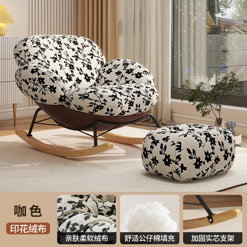 fauteuil bascule moderne beige noir orange roulettes coussin repos minimaliste salon