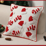 coussin noël brodé blanc rouge motifs cannes sucre opacité décoratif zipper
