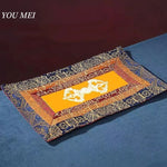 serviette table brodée ornements floraux orange bleu marine rouge classique fait main pâques table