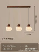 suspension lumineuse trois abatjour bois foncé blanc laiteux moderne minimaliste