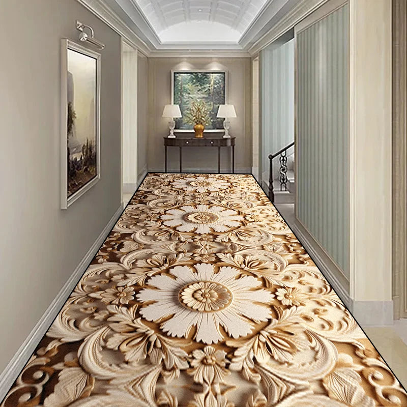 Couloir élégant avec des motifs floraux sculpturaux sur le sol, une console décorée et un cadre mural de paysage, créant une ambiance raffinée et accueillante.