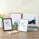 cadres photo bois blanc noir cactus fleurs hortensias paysage montagne tulipes jaunes minimaliste