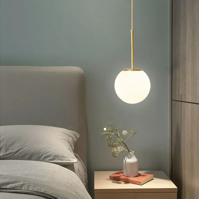suspension lumineuse moderne or blanc sphérique mat câble suspendu minimaliste chambre restaurant