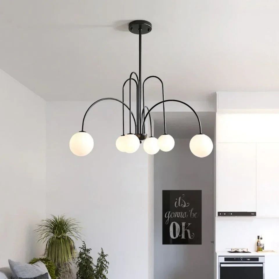 suspension lumineuse moderne sphères translucides structure métallique or rouge brun lumière led chambre salon