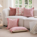 coussin deco boho chic rose blanc motif geometrique franges opaques canape lit decoration intérieure