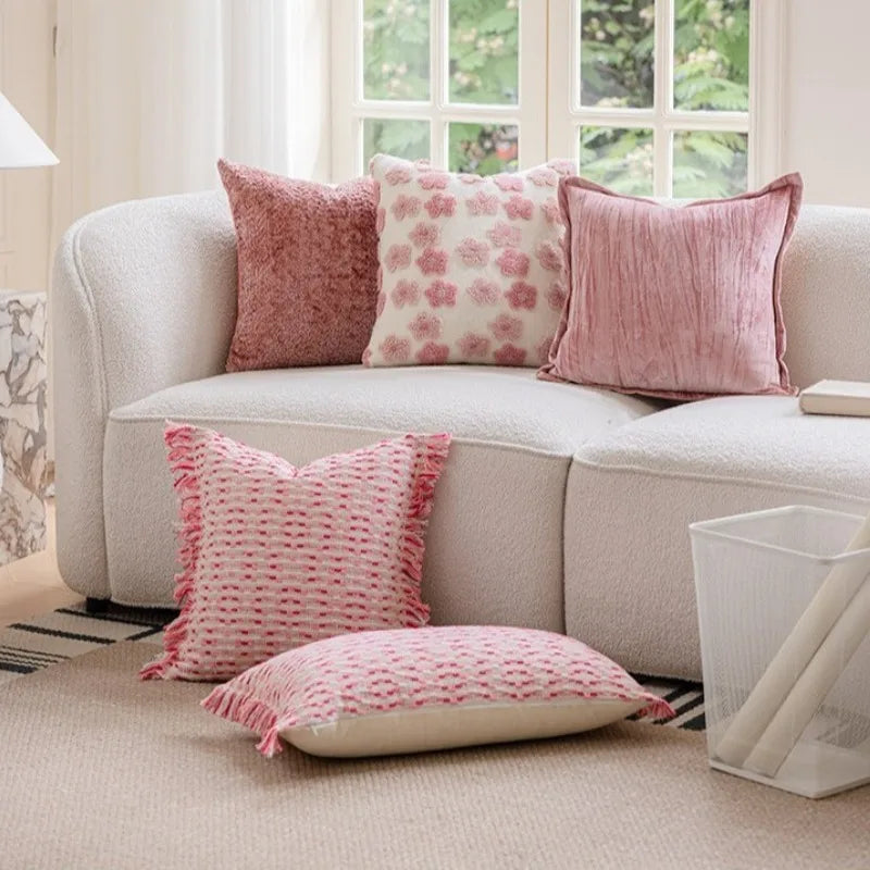 coussin deco boho chic rose blanc motif geometrique franges opaques canape lit decoration intérieure