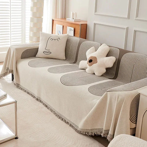 couverture canapé moderne motif géométrique beige gris oreiller décoratif