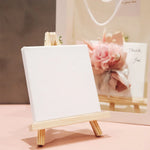 toiles peintes vierges artistiques mini chevalet bois clair couleurs vives motifs paysage portrait
