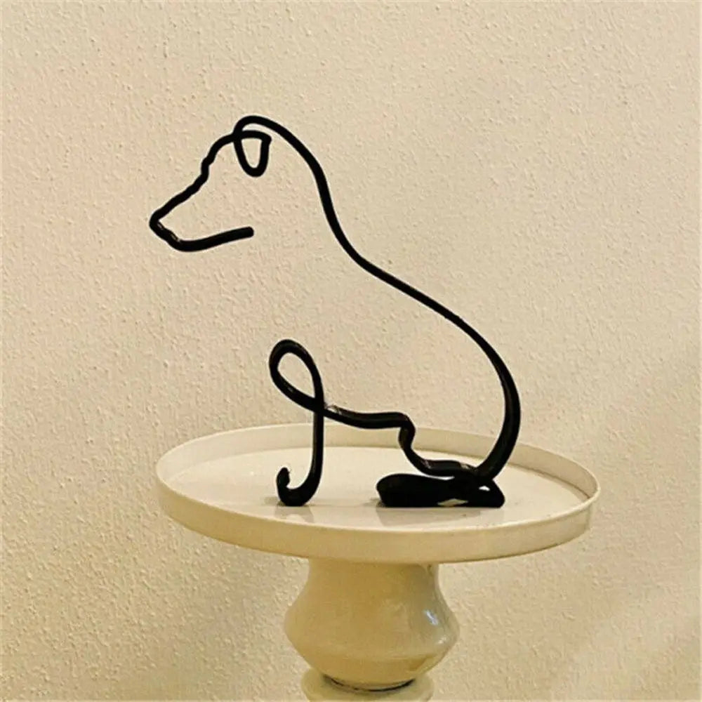 ornement animalier sculpture chien forme abstraite moderne matériaux métal couleur noire ornement intérieur contemporain