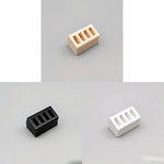 support chargeur moderne réutilisable plastique beige clair quatre fentes opaques objets divers respectueux environnement