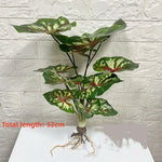 décoration murale moderne plante artificielle feuilles vertes racines apparentes salon chambre coucherextérieur