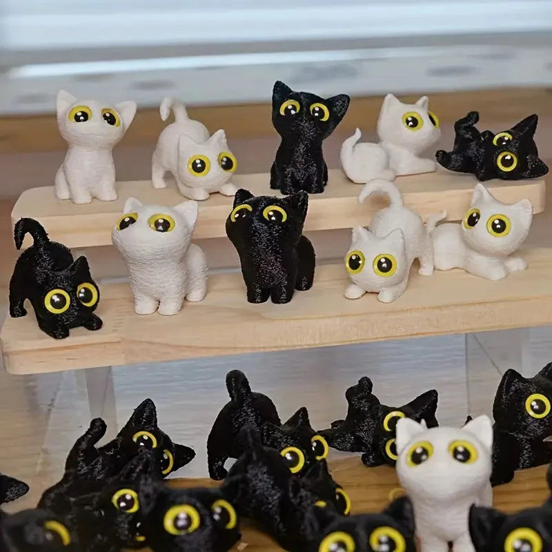 figurines chats miniature résine noir blanc yeux jaunes brillants cartoon mignon décoration erotiquecollector