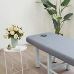 table massage adulte gris clair moderne couverture tabouret pieds