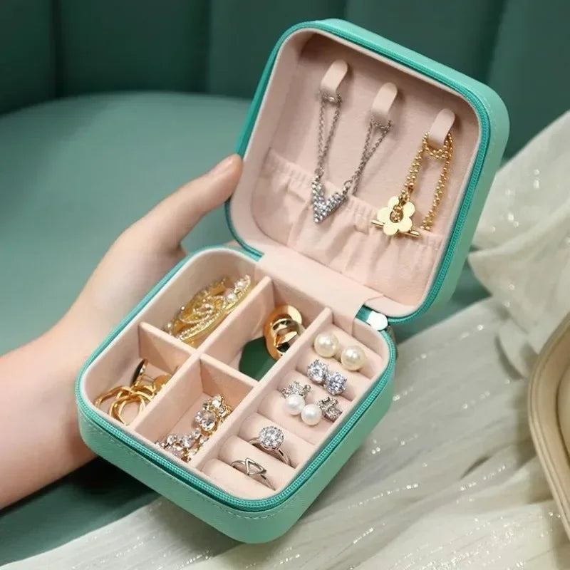 boîte bijoux portable cuir velours moderne fermeture glissière rangement colliers boucles doreilles bagues bracelets