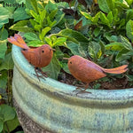 statues oiseaux marron rouille métal rustique jardin extérieur décoration aspect vieilli texture rugueuse deux