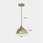 suspension lumineuse verre teinté art deco or marron bleu clair motifs géométriques opacité chaînes