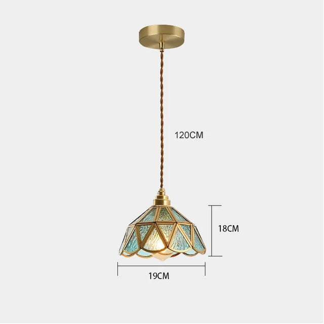 suspension lumineuse verre teinté art deco or marron bleu clair motifs géométriques opacité chaînes