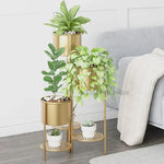 étagère plantes moderne or fer niveaux pots différents ajourées minimaliste