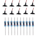composants électroniques résistances bleues connecteurs câbles adhésifs noir bleu rouge jaune