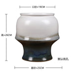 Élégant vase en céramique aux couleurs nuancées, avec un motif en dégradé de gris et de noir, offrant une décoration moderne et raffinée pour l'intérieur.