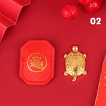 pendentif tortue dorée motif cuir rouge orné feng shui chance richesse décoration intérieure souvenir