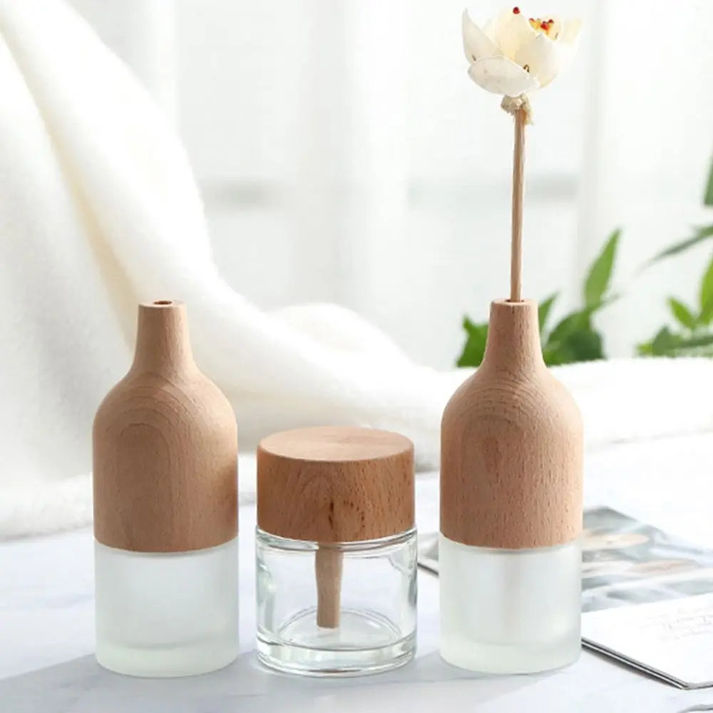 bouteille aromathérapie bois naturel blanc translucide huile essentielle verre dépoli minimaliste diffusion parfum
