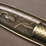cendrier artisanal doré poissons motifs géométriques salon vintage