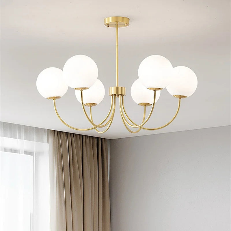 lustre moderne sphères translucides structure dorée blanc led salon chambre