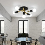lampe moderne or noir sphères blanches structure métallique trois ampoules chambre étude moderne