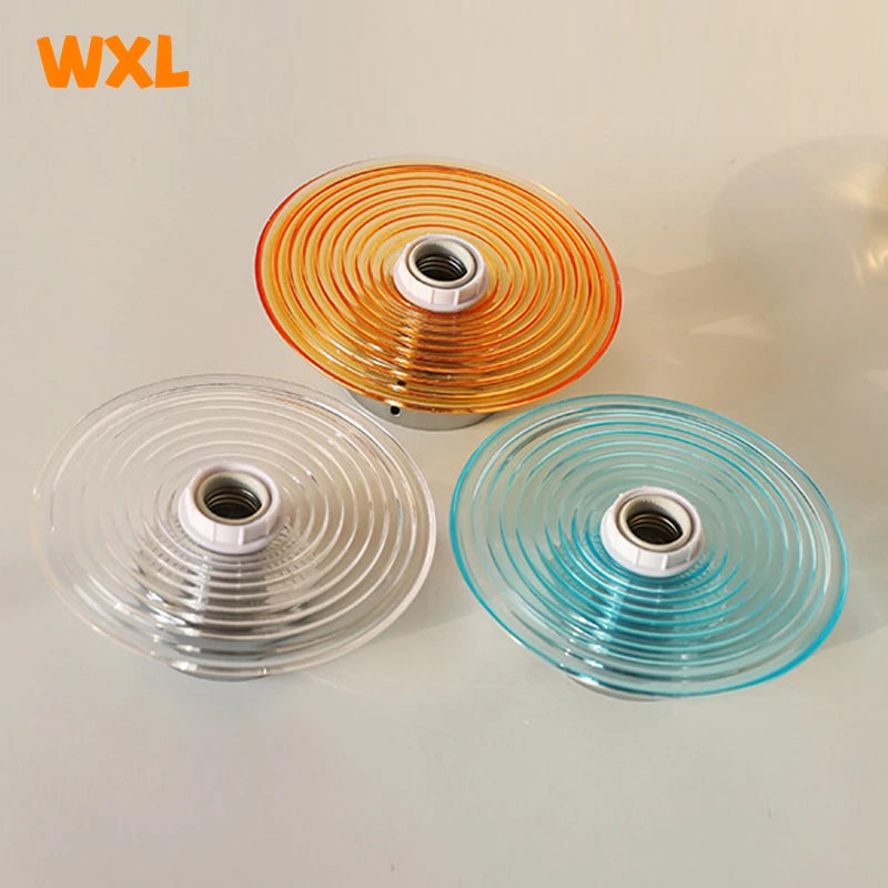 lampe murale moderne orange transparent bleu clair rayures concentriques led vis fixe chambre cuisine
