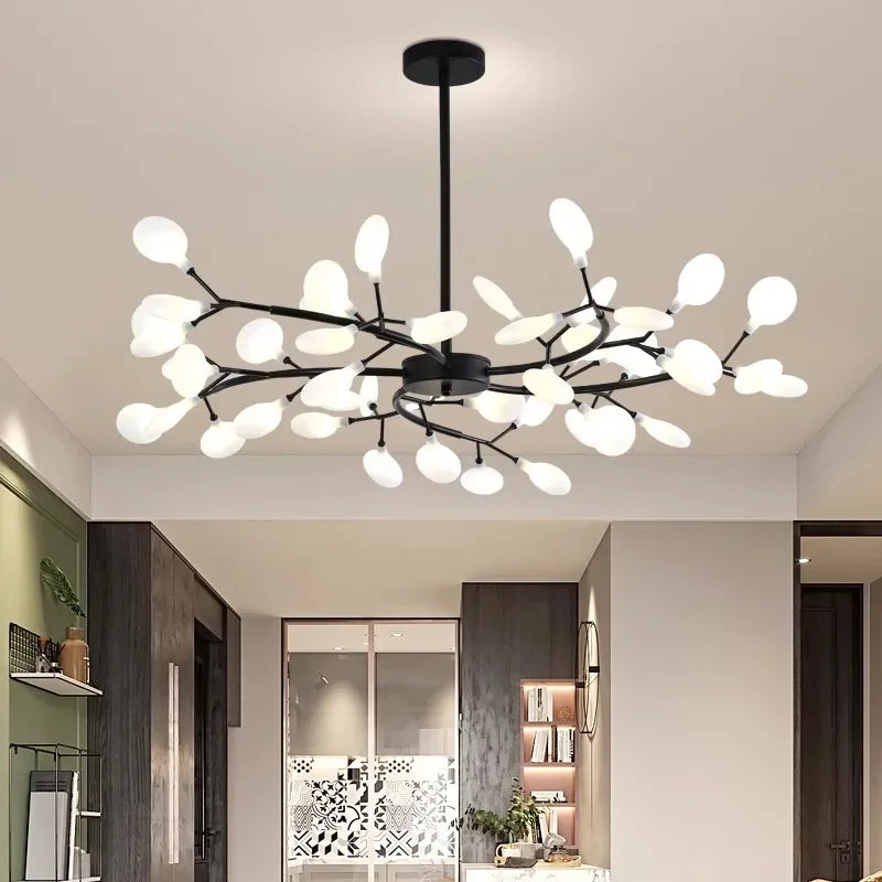 suspension lumineuse contemporaine branches stylisées or noir lumière blanche minimaliste