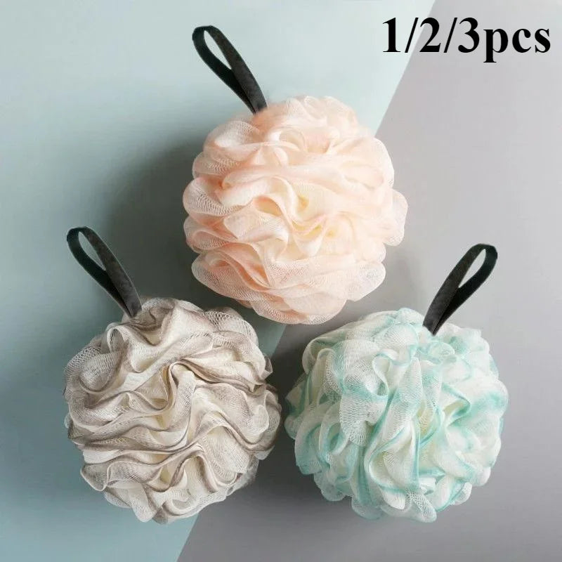 boule bain éponge nettoyage douce maille fine fluffy moderne rose clair vert anneaux noirs
