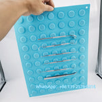 plateau instruments dentaires bleu turquoise texturé cercles relief opaques professionnel