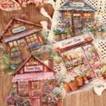 autocollants muraux motifs maisons fleurs détaillés couleurs marron bleu vert rose jaune violets opaquesscrição