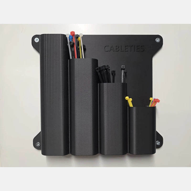 organisateur mural câbles zip ties rangement outils noir industriel minimaliste