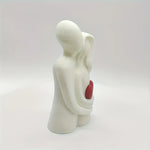 figurines decoratives couple abstrait minimaliste noir blanc rouge texture granuleuse erotique deco chambre