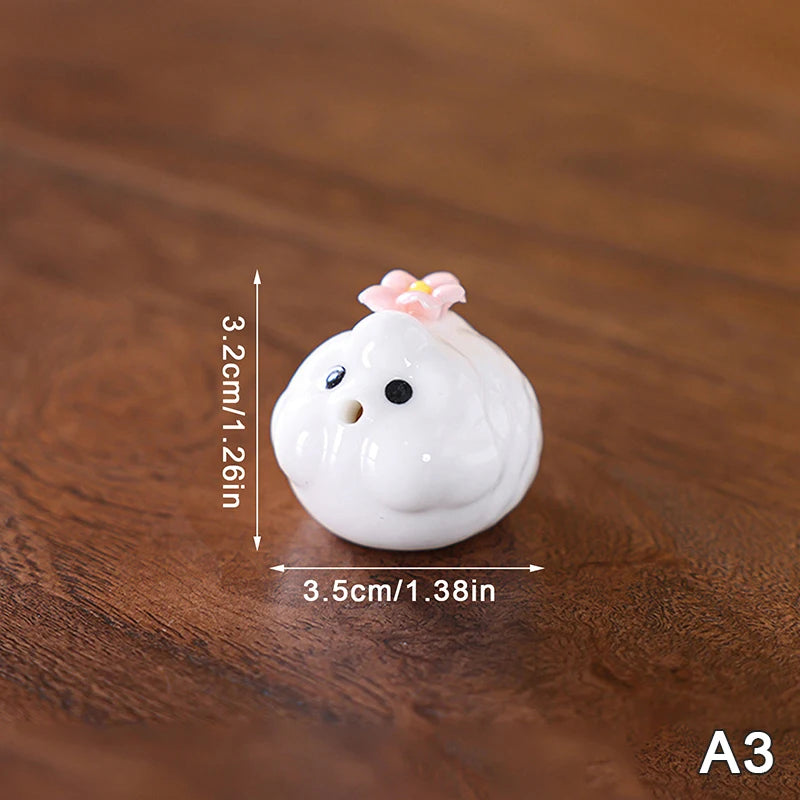bol thé décoratif motifs fleurs pois rose blanc figurines porc céramique artisanal