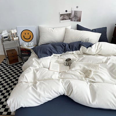 Housse de couette 160x200 cm en polyester doux couleur noire sur lit moderne