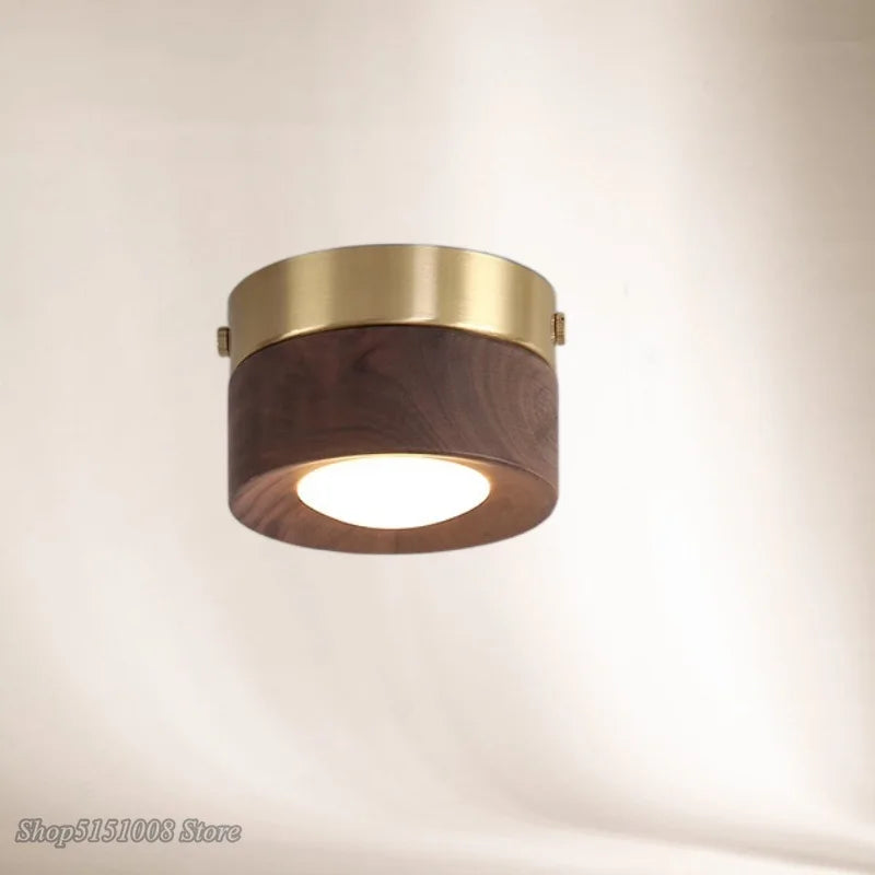lampe moderne or noir bois brillant éclairage quotidien monté surface minimaliste