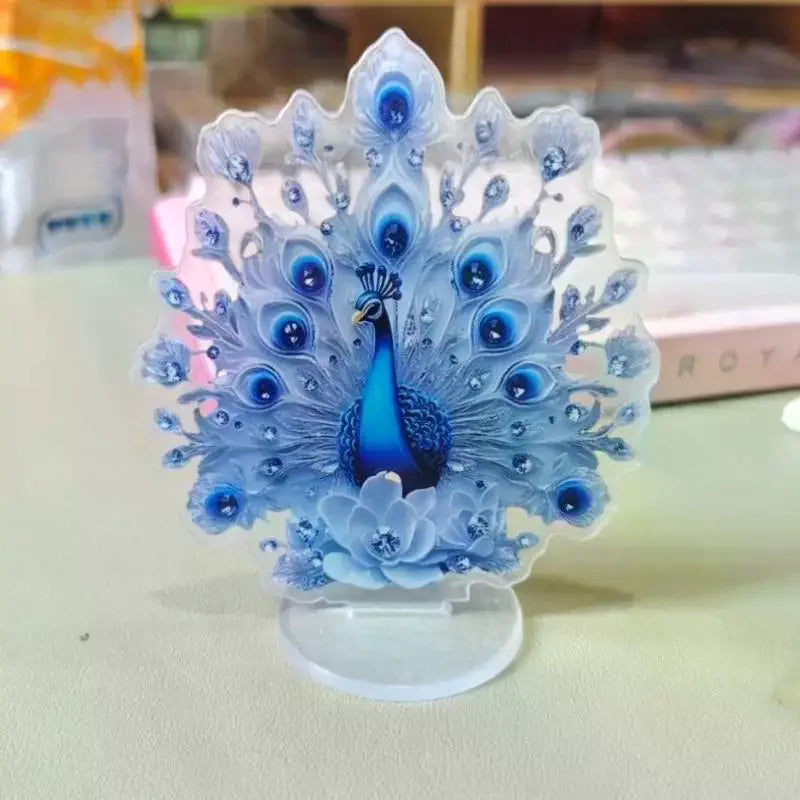 statue paon bleu plumes strass motif floral décoration intérieure support transparent ornement