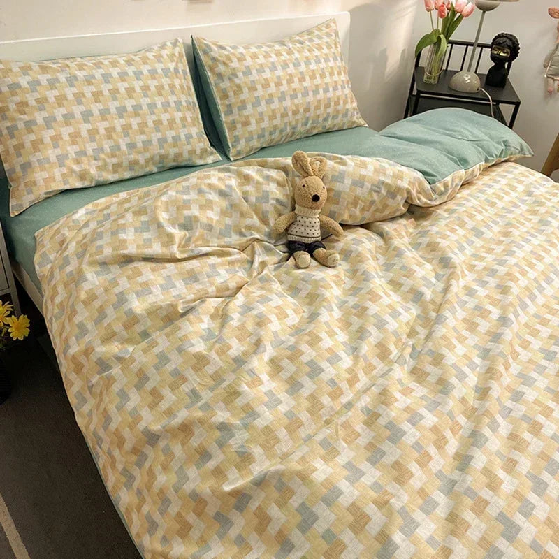 Ensemble literie coton avec taies d'oreiller sur un lit queen size
